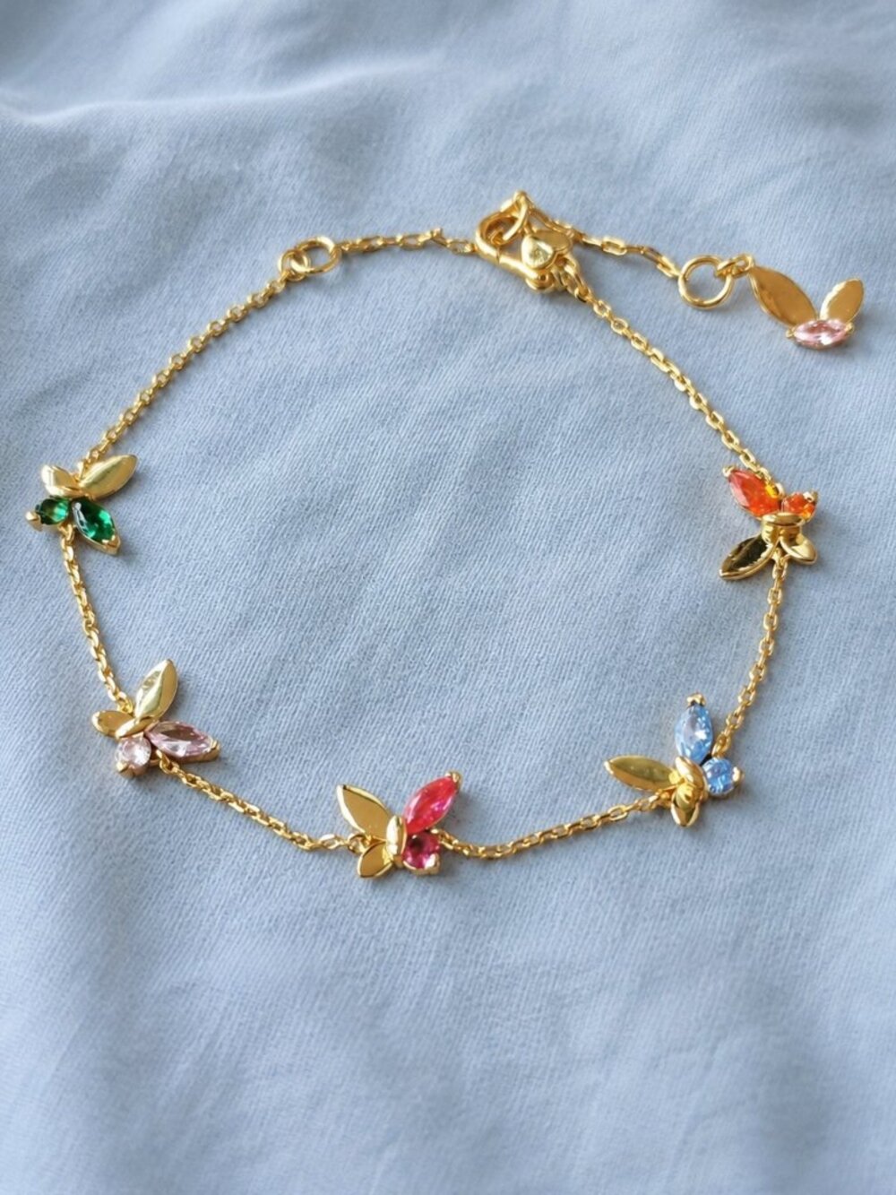 social butterfly charm bracelet gold